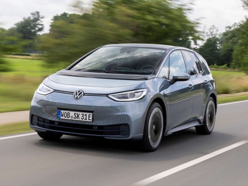 A first-generation Volkswagen ID.3 electric hatchback on the road